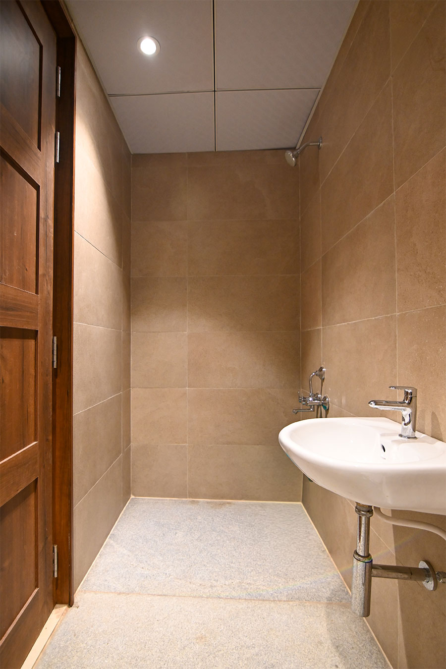 Clean modern restrooms with marble tiles