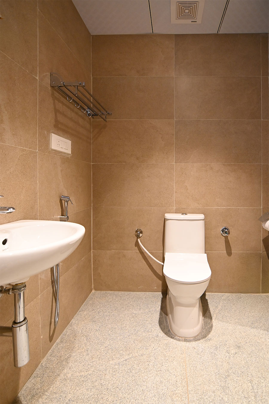 Clean modern restrooms with marble tiles