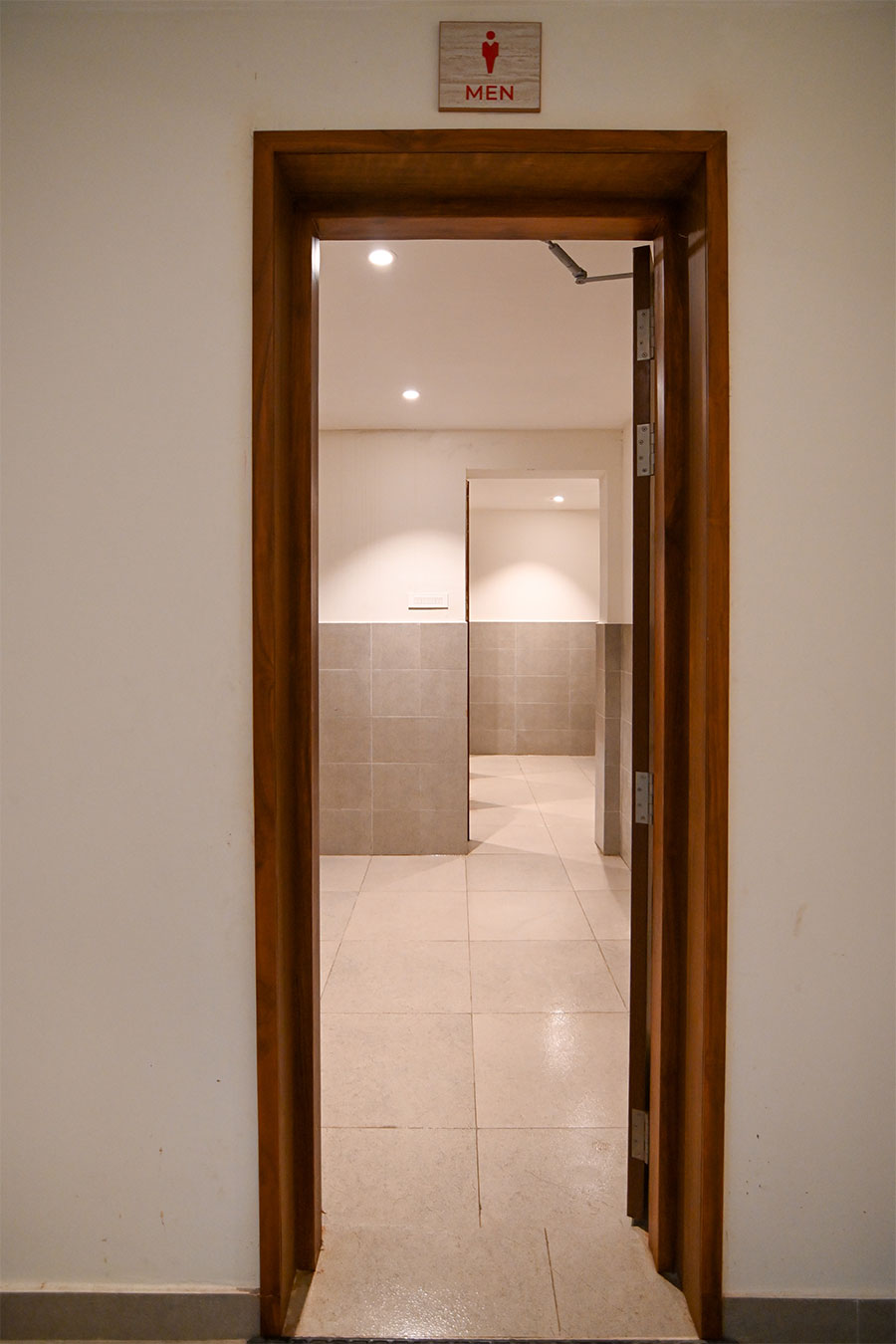 Clean modern restrooms with marble tiles
