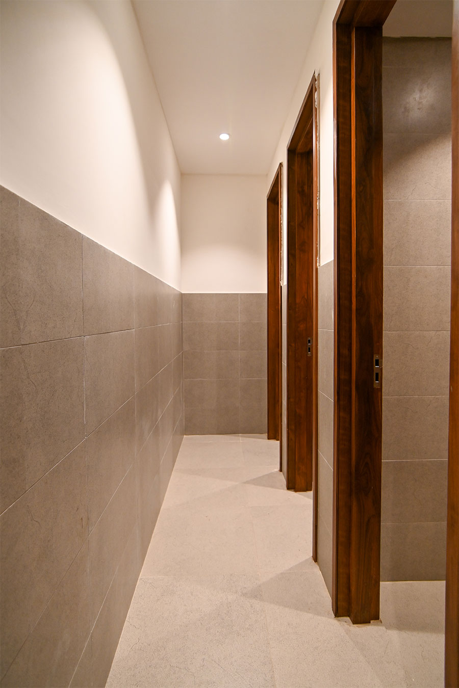 Clean modern restrooms with marble tiles