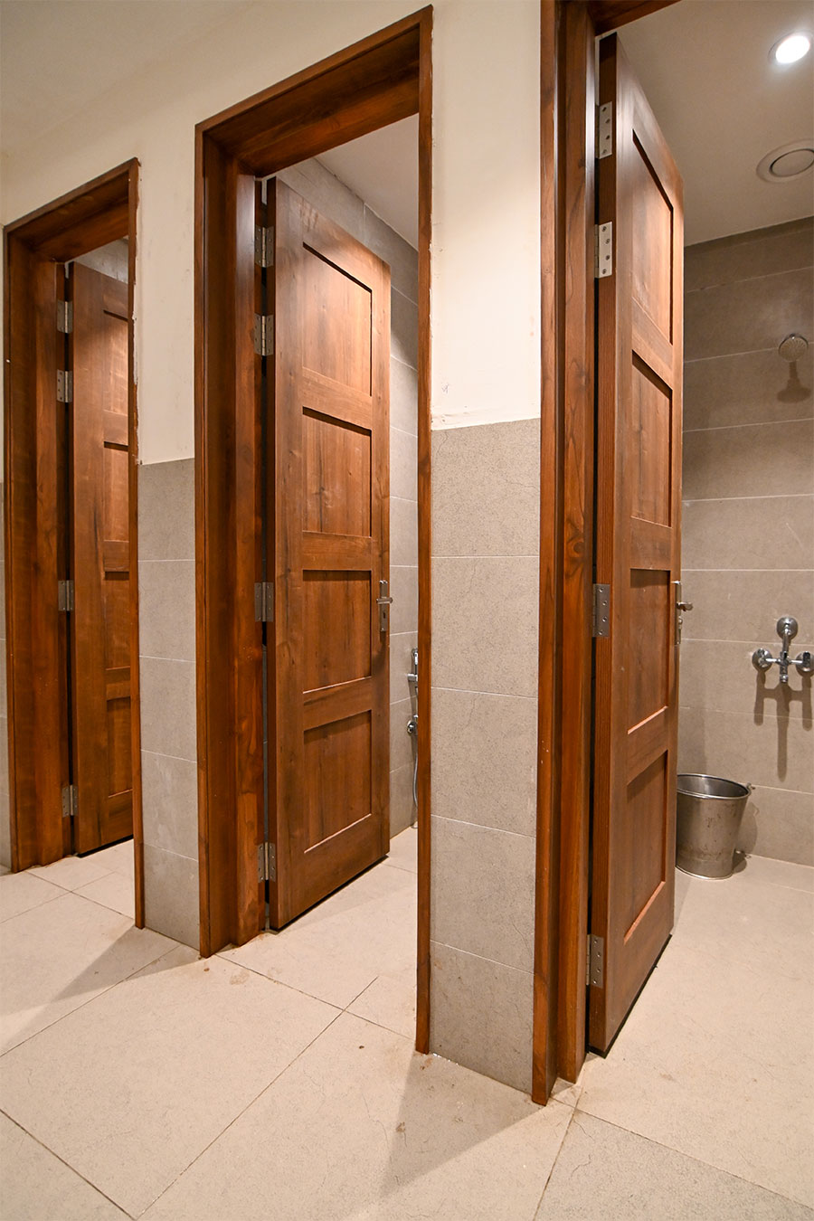 Clean modern restrooms with marble tiles