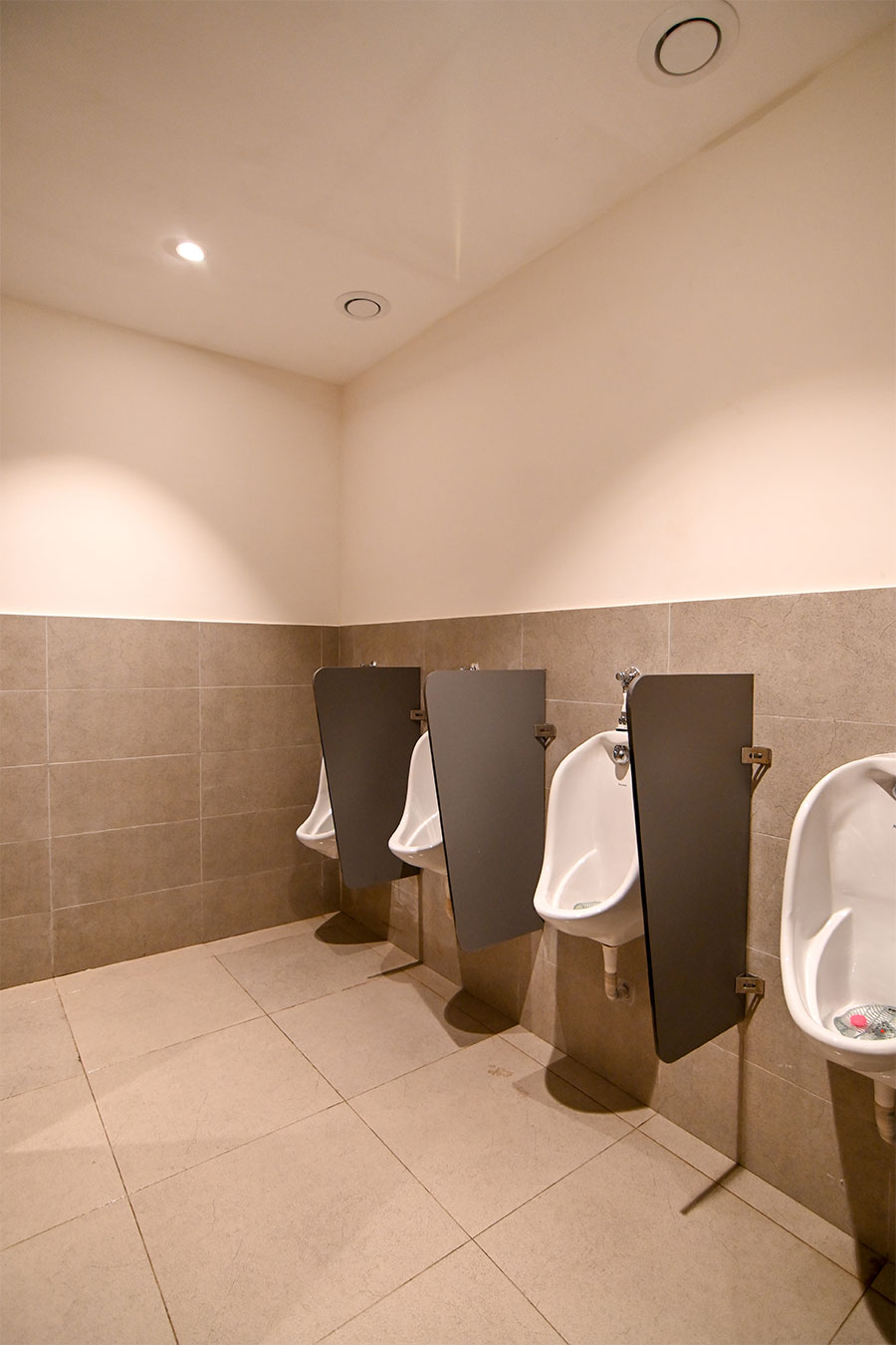 Clean modern restrooms with marble tiles